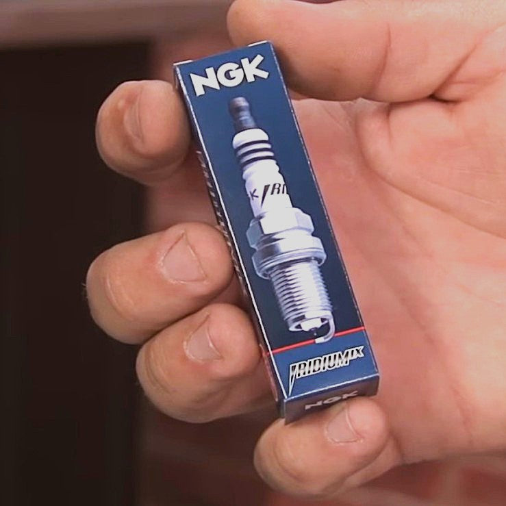 Various pieces of equipment using spark plugs and caps