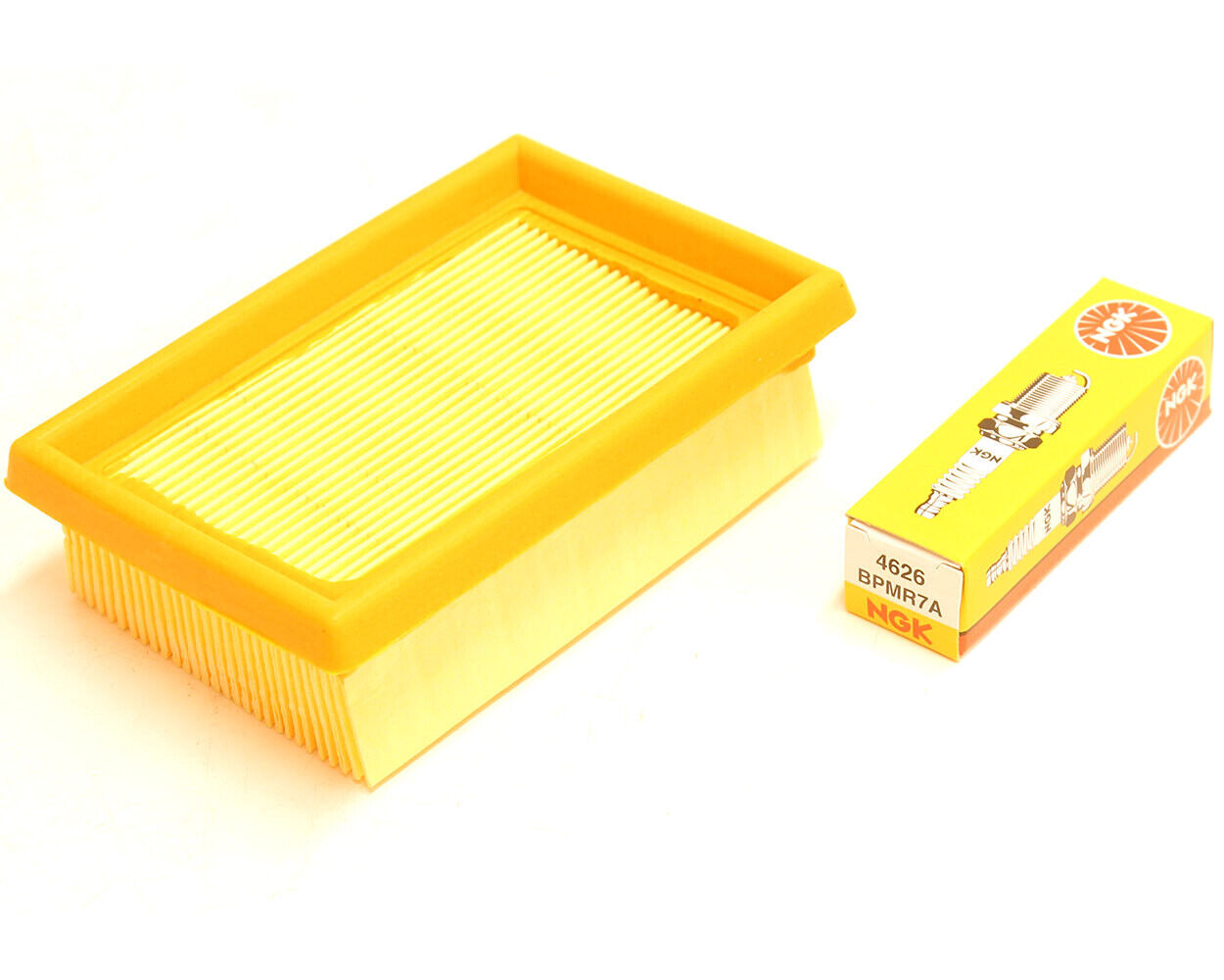 Orange air filter suitable for Stihl models BR320 BR340 BR340L BR380 BR400 BR420 BR420C SR340 SR420 with an NGK BPMR7A spark plug laying beside